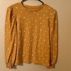 Gold girls long sleeve top with white flowers never worn